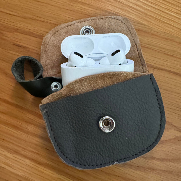 Brown and green leather earbud holder