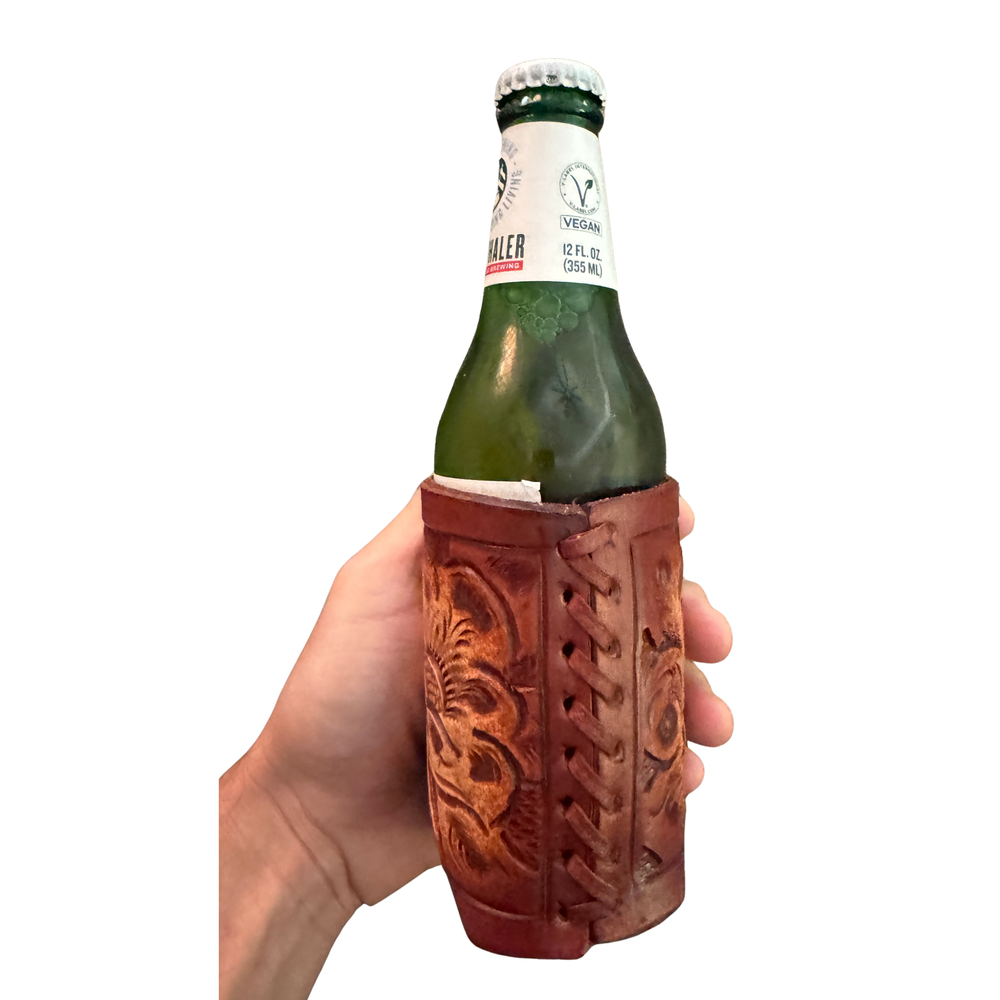 Tooled leather can holder on a standard 12 oz beer can