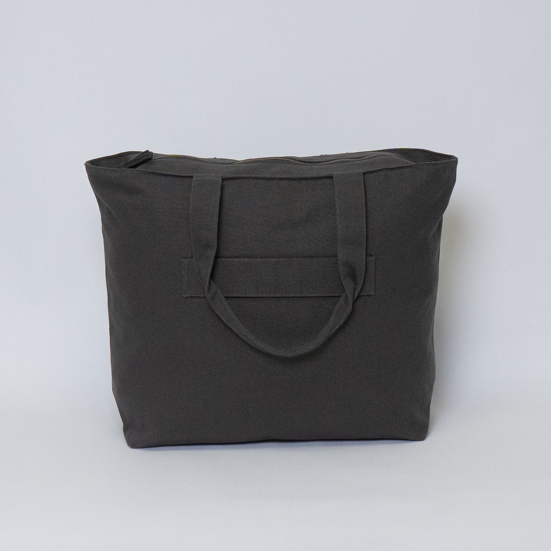 Tote bags with trolley sleeve
