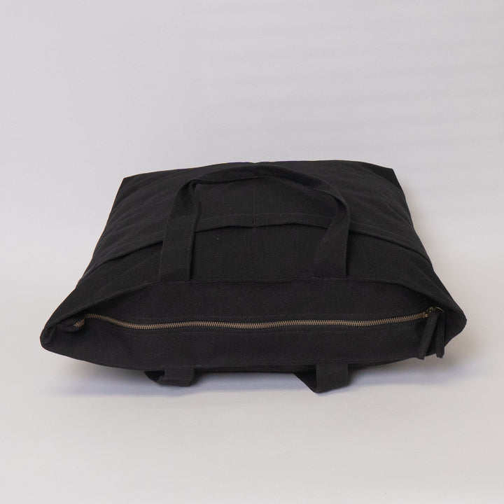 Tote bags with trolley sleeve