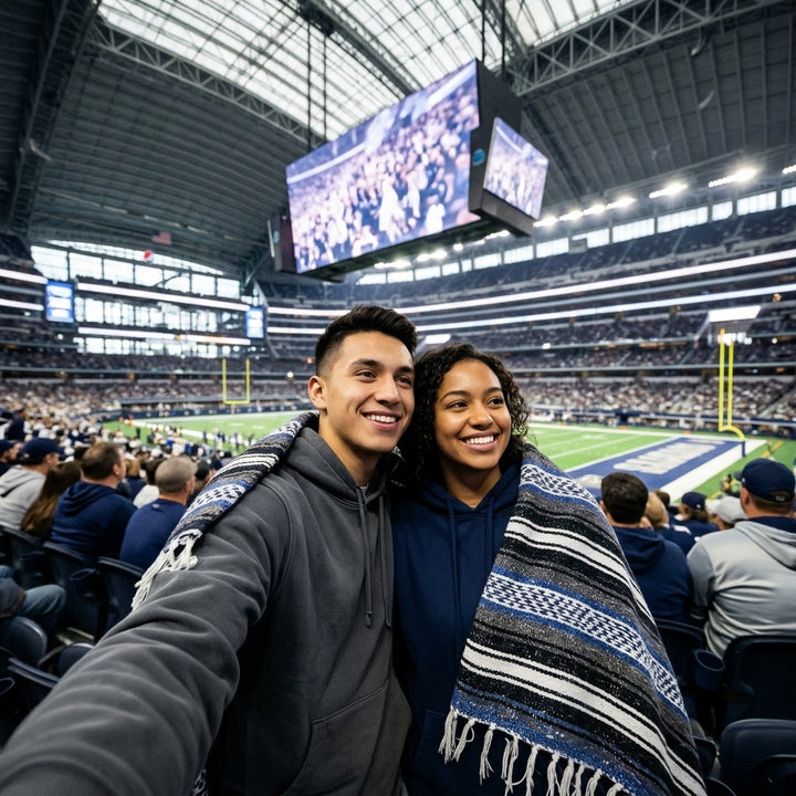 Fan wrapped in a Mexican stadium blanket at a Dallas football game