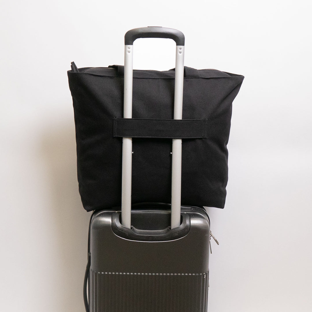 Tote bags with trolley sleeve
