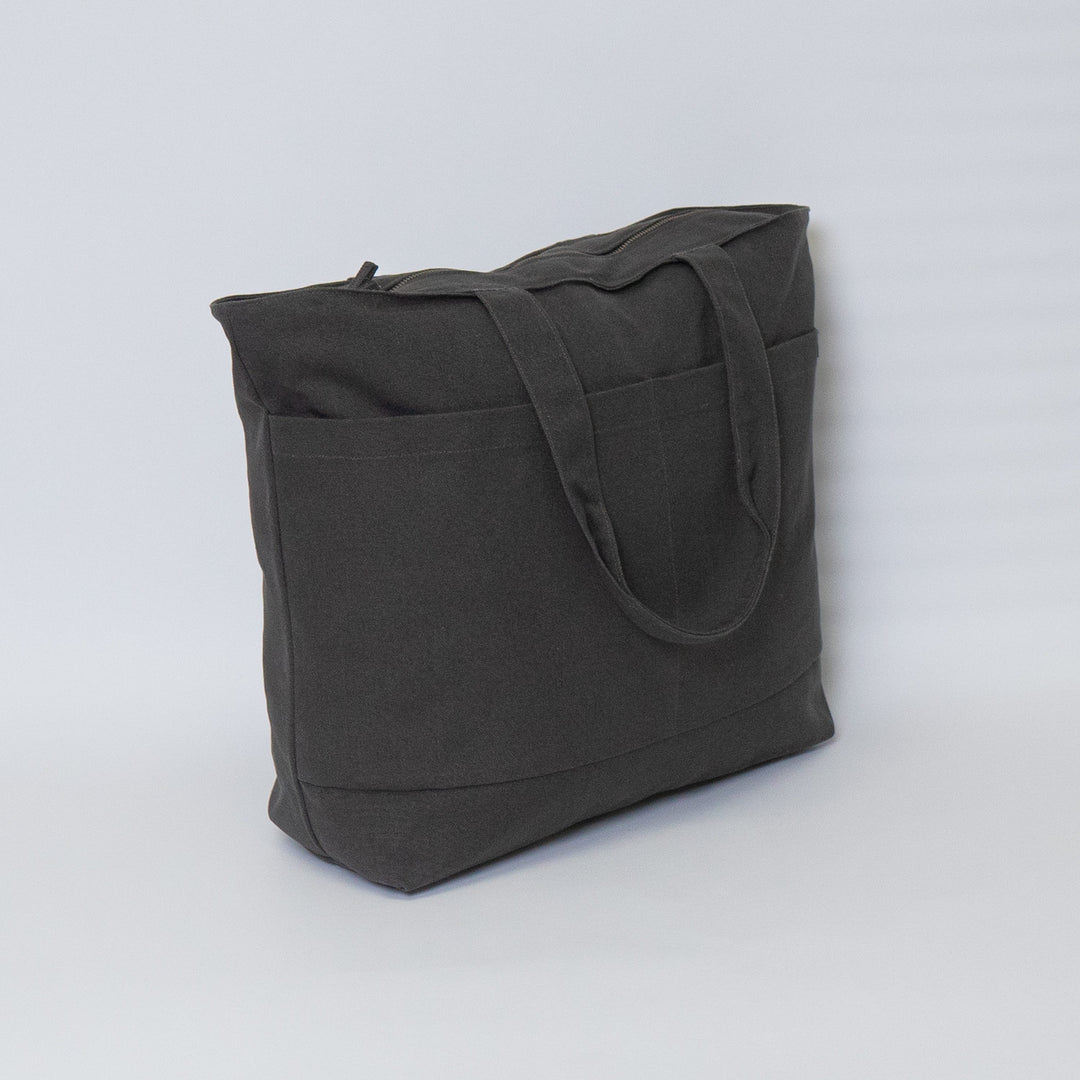 Tote bags with trolley sleeve