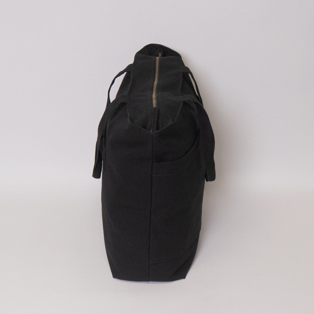 Tote bags with trolley sleeve