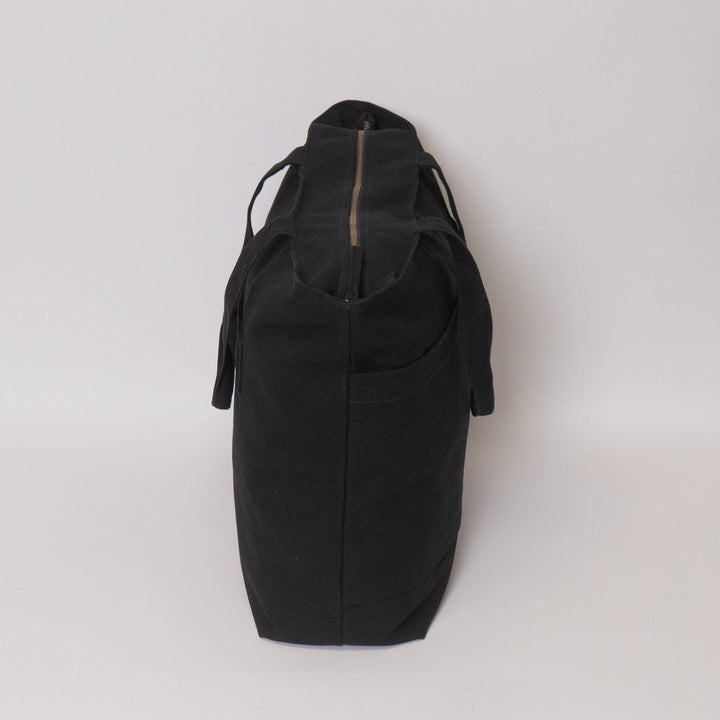 Tote bags with trolley sleeve