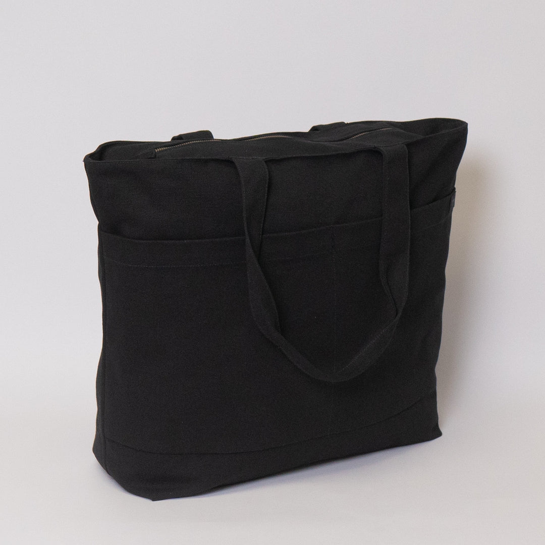 Tote bags with trolley sleeve