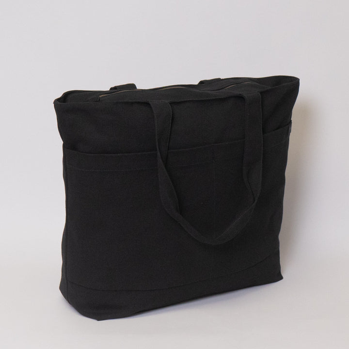 Tote bags with trolley sleeve