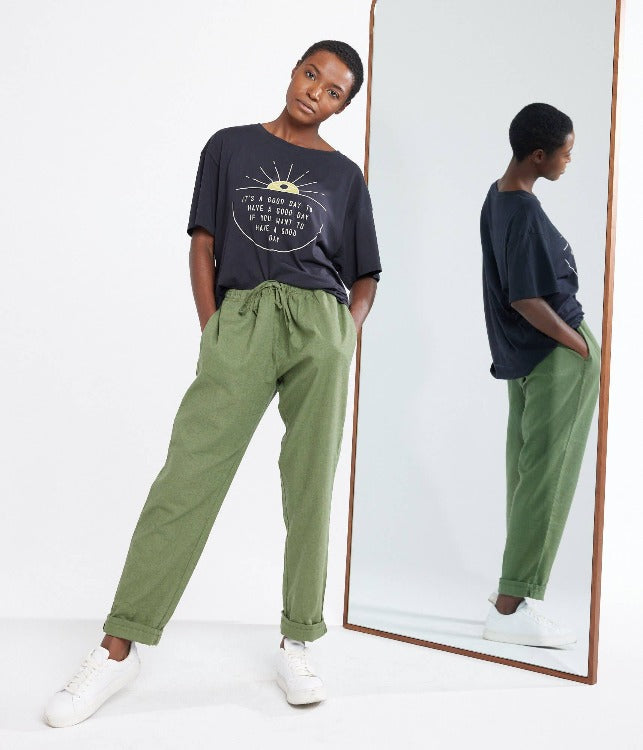 model in army colored blaine pant by Known Supply
