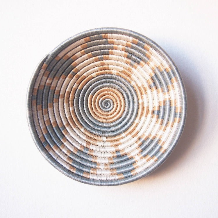 Multicolored handwoven bowl by Amsha