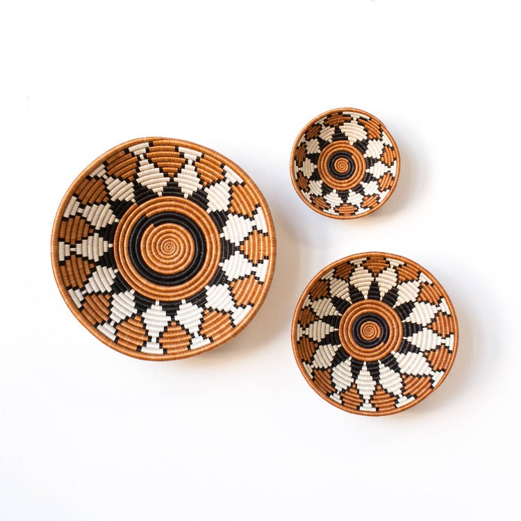 Amsha's Bungoma handwoven bowls on wall