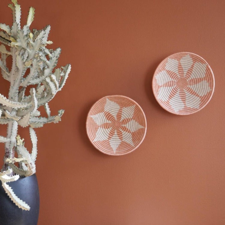 Decorative bowls on the wall by Kazi 