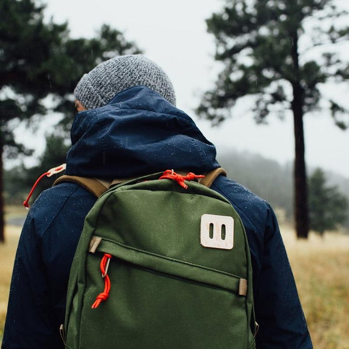 green topo design backpack